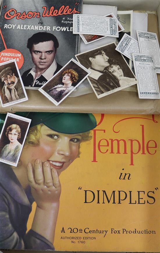 Hollywood Movie Stars official studio photographs, 1940s and 50s, in four albums and others loose in original envelopes